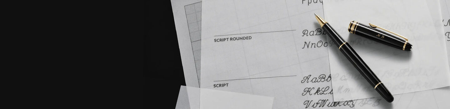 A Montblanc pen on paper sheets.